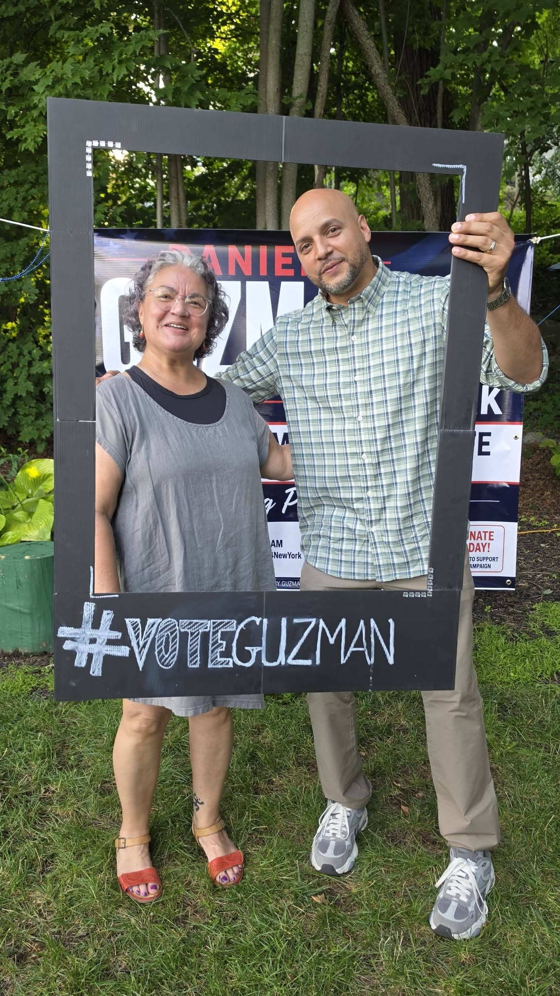Daniel Guzman with community members at a campaign event