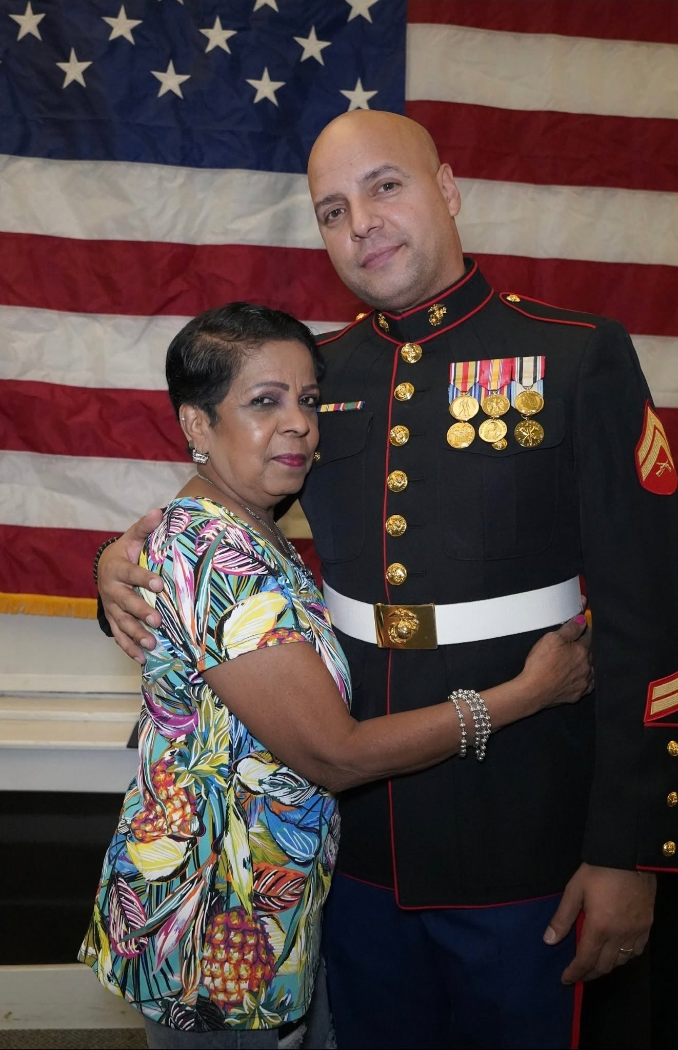Daniel Guzman with his mother at a military ceremony